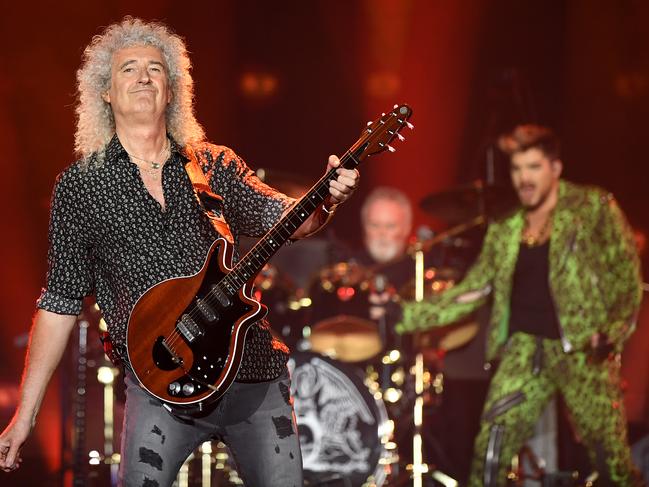 Brian May (left) and Adam Lambert of Queen performs during the Fire Fight Australia bushfire relief concert at ANZ Stadium in Sydney. Picture: AAP