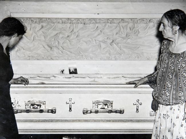 For gypsy story by Mark Morri - Copy pic of Elizabeth Sterio (wife on L) and Mary Sterio (mother on R) with the coffin of Gypsy Prince Costa Sterio on Nov 8, 1943.