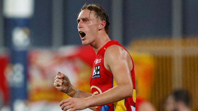 DARWIN, AUSTRALIA - MAY 11: Sam Clohesy of the Suns celebrates a goal during the 2024 AFL Round 09 match between the Gold Coast SUNS and North Melbourne Kangaroos at TIO Stadium on May 11, 2024 in Darwin, Australia. (Photo by Dylan Burns/AFL Photos via Getty Images)