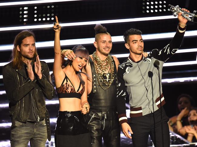 Jack Lawless, JinJoo Lee, Cole Whittle and Joe Jonas of DNCE accepts the award for Best New Artist onstage during the 2016 MTV Video Music Awards. Picture: AFP