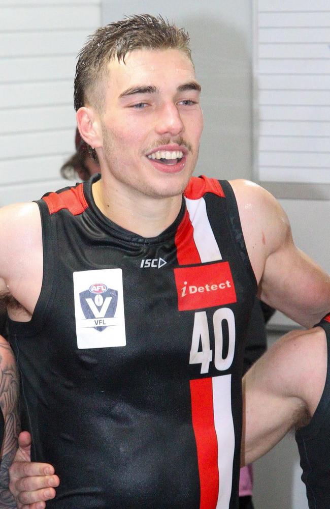 Liam Reidy sings the Frankston song after his VFL call-up. Pic: Matt Walker.