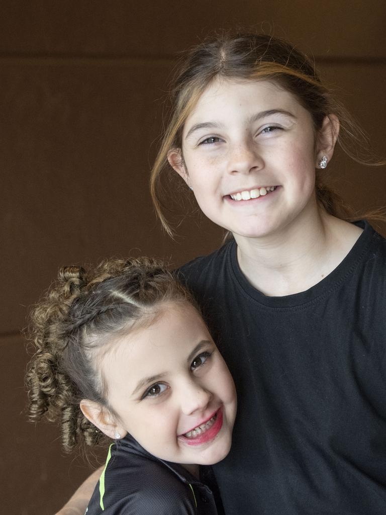 Allegra Hoye 6yo with sister Arianna Hoye 11yo. The 76th City of Toowoomba Eisteddfod. Friday, August 5, 2022. Picture: Nev Madsen.