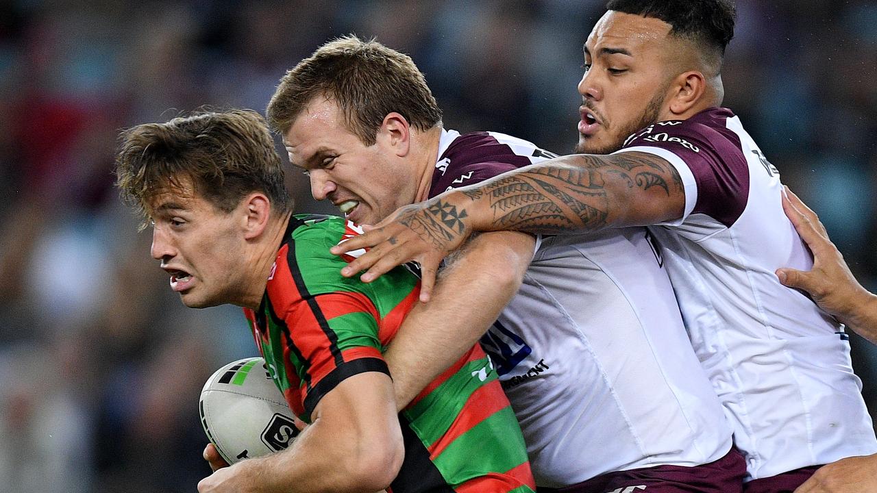 Two of the game’s finest: Cameron Murray of the Rabbitohs is tackled by Manly’s Jake Trbojevic. Picture: AAP