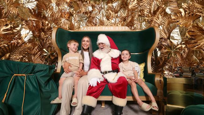 Santa is at Pacific Fair again. Sophie Zavos with kids Dillon 5 and Armani 3 Zavos. Picture: Richard Gosling