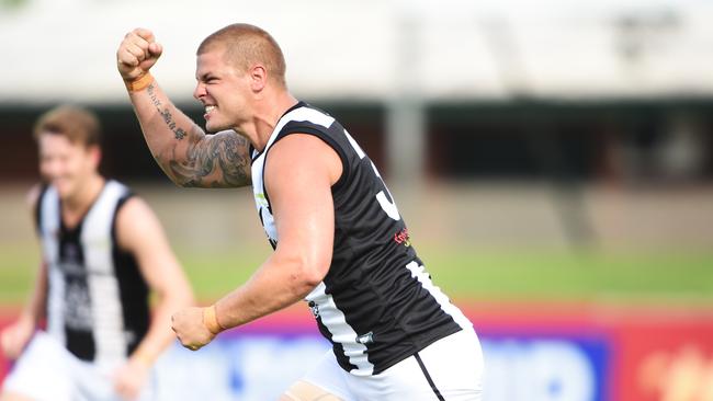 Cameron Cloke, pictured playing for NTFL club Palmerston, is locked in a transfer tangle with Jacana and Hurstbridge. Picture: Helen Orr.