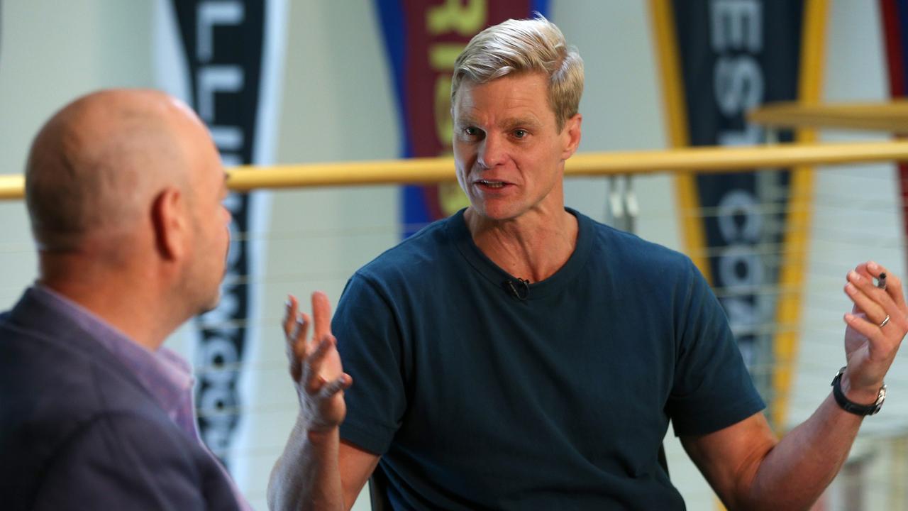 Nick Riewoldt (right) speaks with Mark Robinson.