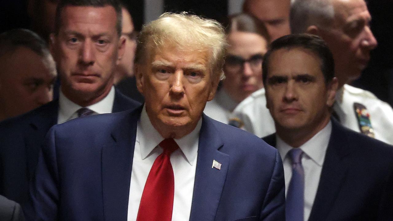 Mr Trump departs a pre-trial hearing Picture: Spencer Platt/Getty Images/AFP