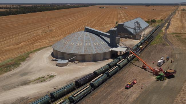 Drone image of the train being loaded in 2016 with grain from Stuart Tighe’s farm in Moree before heading to Newcastle port. Picture: Australian Rail Track Corporation