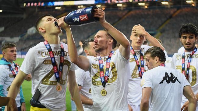 Leeds United players enjoy their title celebration after winning The Championship.