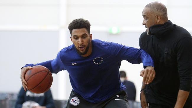 76ers draftee Jonah Bolden working out with Phil Handy at Melbourne United training. Picture: Yuri Kouzmin