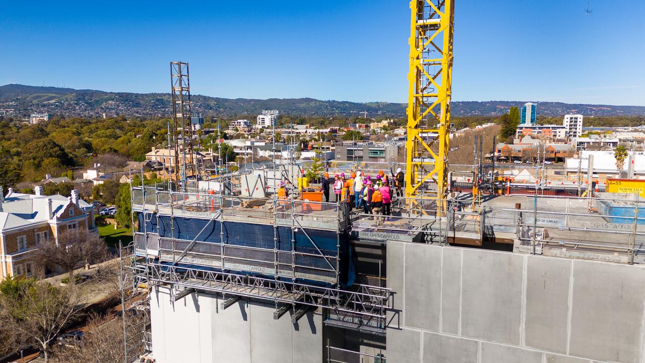 The topping-out ceremony of the $15.7m YWCA Australia's affordable apartment building in Hutt St.