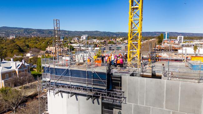 The topping-out ceremony of the $15.7m YWCA Australia's affordable apartment building in Hutt St.