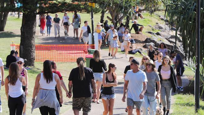 Barricades on Burleigh Hill don’t stop people picnicking and enjoying getting out and about on a glorious autumn day on the Gold Coast. Picture: Glenn Hampson