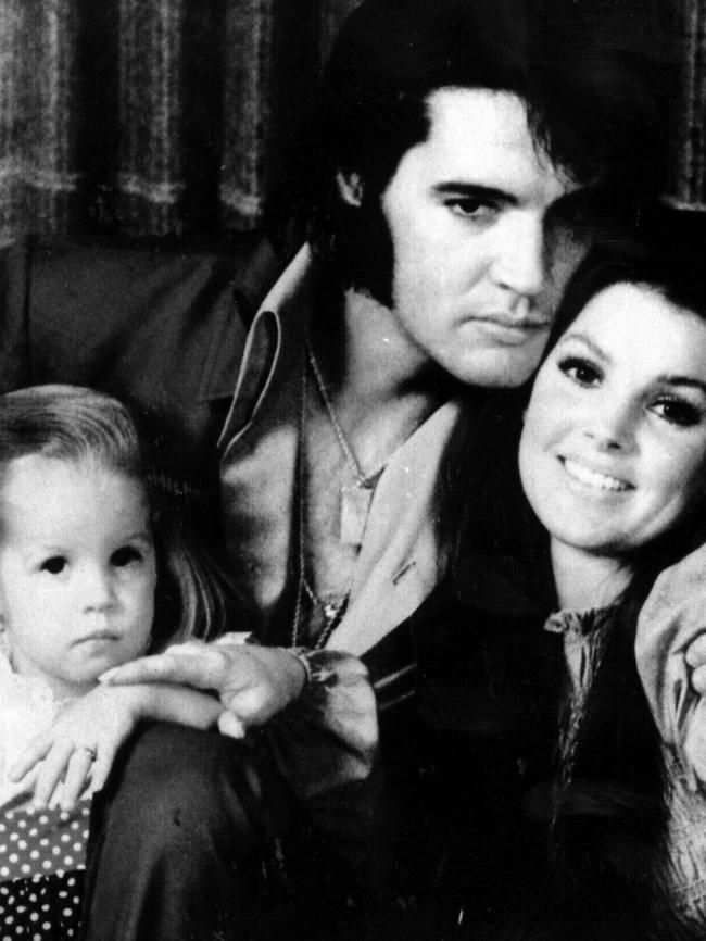 Presley with wife Priscilla with daughter Lisa Marie as a toddler.