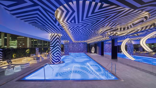 The pool vibes flow day and night at W Brisbane, with guests able to listen to tunes underwater.