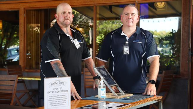 Elite Security Personnel general manager Michael Nobes and managing director Troy Woodall are preparing for the extra workload of manually checking that all patrons follow the government mandate at the Cock and Bull Tavern at Cairns North. Picture: Brendan Radke