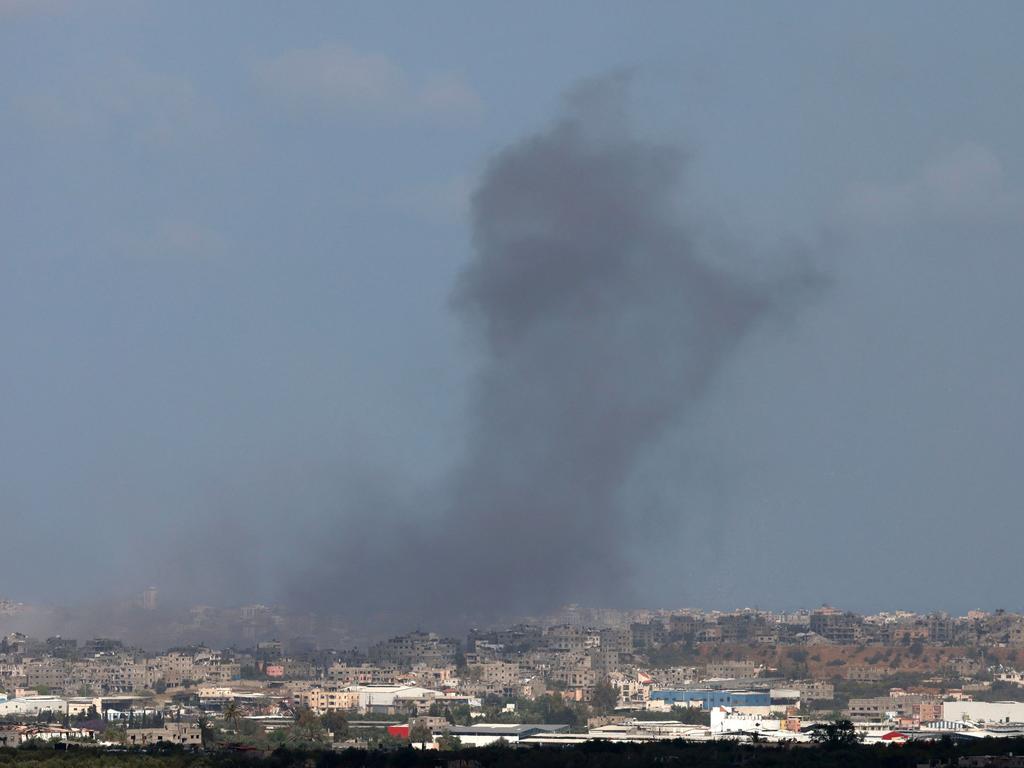 Smoke billows during Israeli bombardment on the Gaza Strip from a position in southern Israel on May 12. Picture: Menahem Kahana/AFP