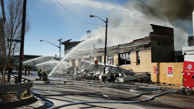 Firefighters battle the July 2018 blaze which destroyed the General Gordon Hotel at Sydenham. Picture: Richard Dobson