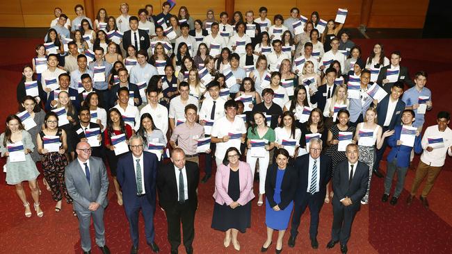 HSC course first place achievers with Premier Gladys Berejiklian, Education Minister Sarah Mitchell and Education Department officials. Picture: John Appleyard