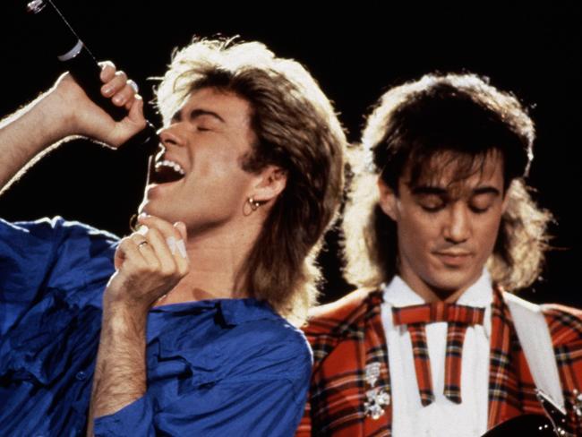 George Michael and Andrew Ridgeley of WHAM! performing in Japan, January 1985. (Photo by Michael Putland/Getty Images)