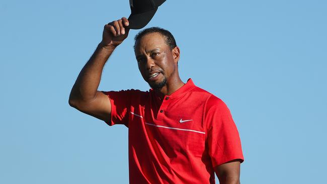 Tiger Woods tips his cap after the final round.