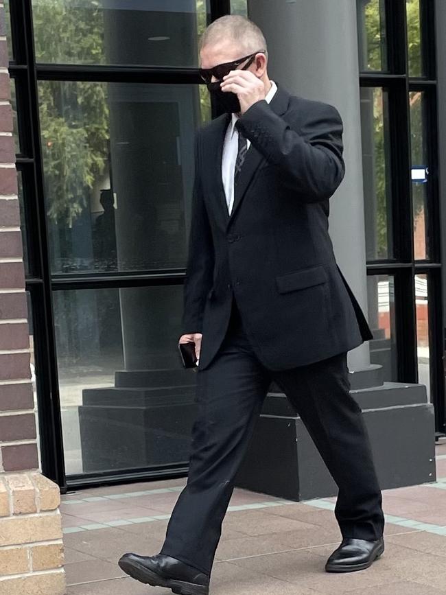 Middleton outside Burwood Court House after being charged with crashing into seven cars last year.