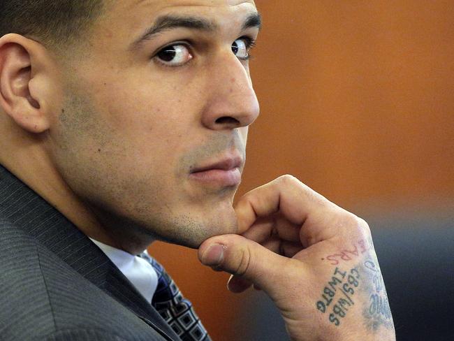 FILE - In this April 1, 2015 file photo, former New England Patriots NFL football player Aaron Hernandez listens as prosecution witness Alexander Bradley testifies during his murder trial, at Bristol County Superior Court in Fall River, Mass. Hernandez is accused of killing Odin Lloyd in June 2013. (AP Photo/Brian Snyder, Pool, File)