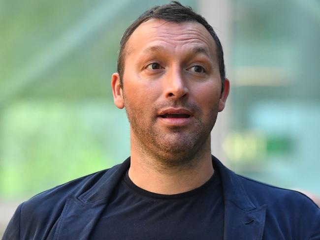 Former olympic gold medallist Ian Thorpe arrives at a press conference on the government's Religious Discrimination Bill at Parliament House in Canberra, Thursday, February 27, 2020. (AAP Image/Mick Tsikas) NO ARCHIVING