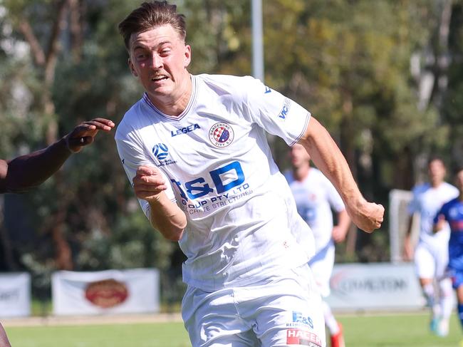 MELBOURNE, AUSTRALIA - FEBRUARY 10 2024 George Lambadaridis of Dandenong City and Kalilou Kamara of Avondale during the NPL Victoria game between Avondale v Dandenong City at Reggio Calabria Club.Picture: Brendan Beckett