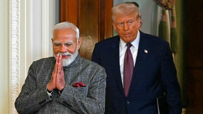 US President Donald Trump and Indian Prime Minister Narendra Modi arrive for a joint press conference in the White House on Thursday. Picture: AFP