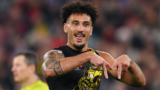 MELBOURNE, AUSTRALIA - MAY 25: Mykelti Lefau of the Tigers celebrates a goal during the round 11 AFL match between Richmond Tigers and Essendon Bombers at Melbourne Cricket Ground, on May 25, 2024, in Melbourne, Australia. (Photo by Morgan Hancock/AFL Photos/via Getty Images)