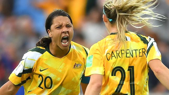 Sam Kerr celebrates with Ellie Carpenter after victory over Brazil last week. Picture: Getty Images