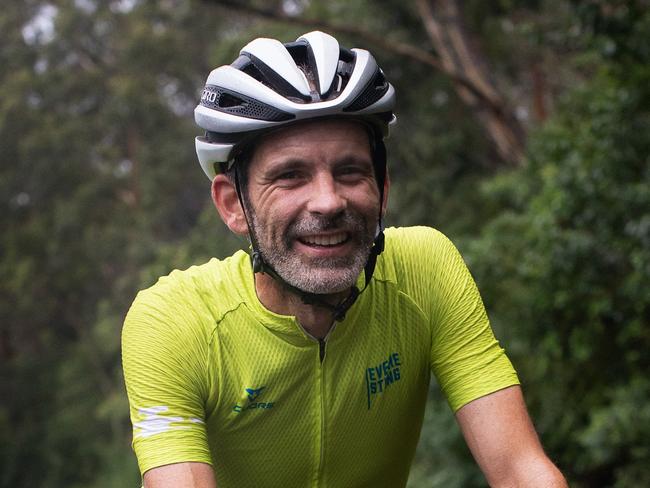 EMBARGO FOR TWAM 6 FEB 2021 FEE APPLIESDenistone, Sydney, NSW, Australia. A portrait of cyclist Jonathan Egan (aged 50 years) while he attempts an "Everesting" ride during which he gains the elevation of Mt Everest in a single day while riding up and down a single hill. On this day he was riding up Florence Avenue in Denistone, a suburb of Sydney. Egan has done 97 Everesting rides. December 22, 2020. David Maurice Smith/Oculi.