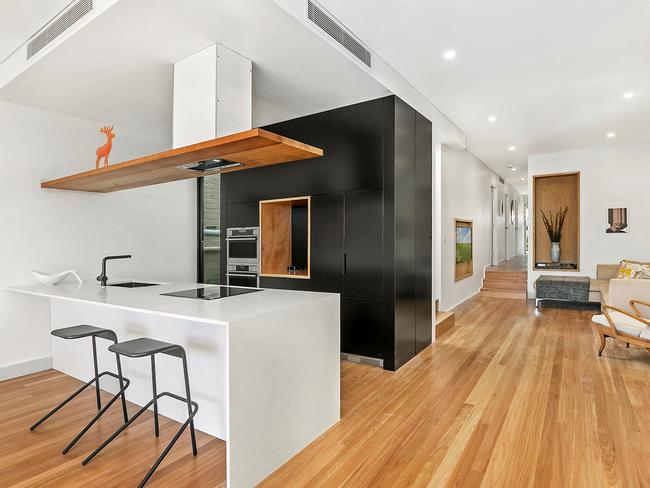 The open-plan kitchen and lounge area.