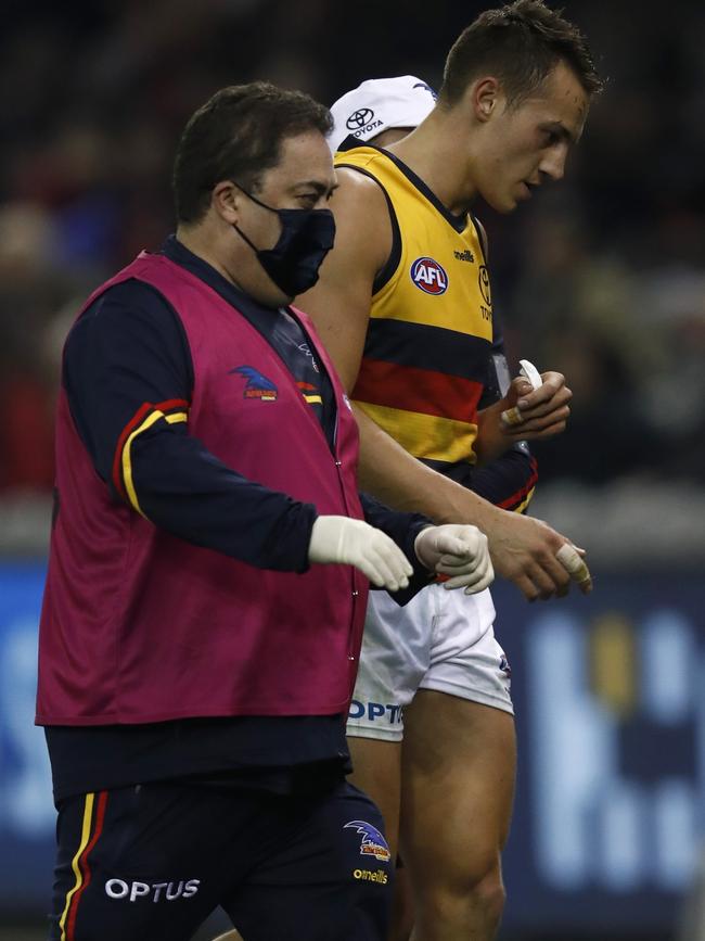 Doedee comes to the bench before later being subbed out with concussion after his heavy hit. Picture: Getty Images