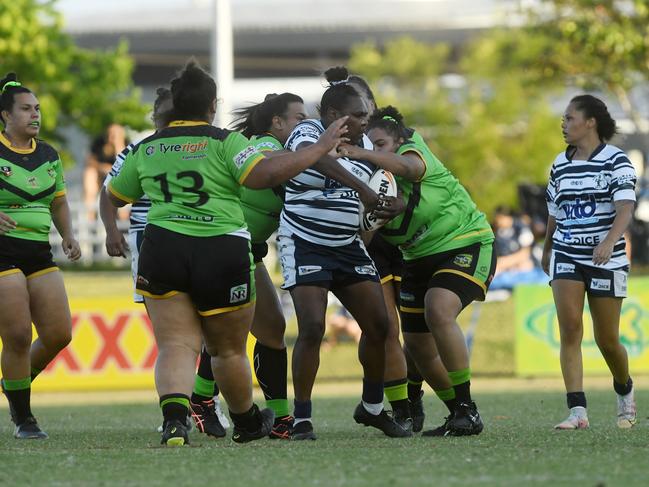 Darwin Brothers Cassiela Wapau is tackled in the Womens NRLNT Grand Final 2022. Picture: (A)manda Parkinson