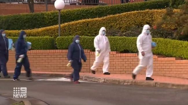 Cleaners at Tangara School for Girls in Cherrybrook, which has had a COVID-19 outbreak. Picture: Channel 9