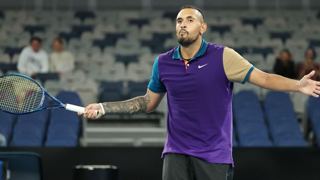 Nick Kyrgios welcomes the crowd’s applause after landing a tweener late in the third set Picture: Michael Klein