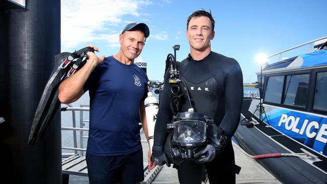 L to R, Senior constable James Hall police diver with Senior Constable Michael Turner police diver, part of the QPS dive squad, Port of Brisbane, Wednesday February 3rd 2021 – Photo Steve Pohlner