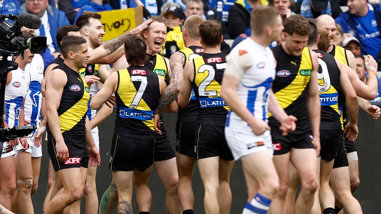 MELBOURNE, AUSTRALIA - AUGUST 19: Jack Riewoldt of the Tigers celebrates a goal with teammates during the 2023 AFL Round 23 match between the Richmond Tigers and the North Melbourne Kangaroos at Melbourne Cricket Ground on August 19, 2023 in Melbourne, Australia. (Photo by Michael Willson/AFL Photos via Getty Images)