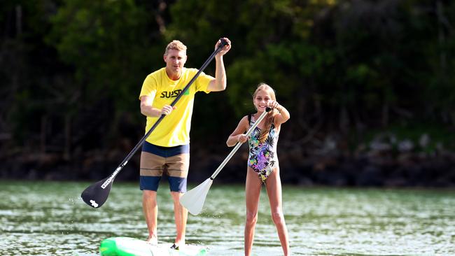 SUPing at Tallebudgera Creek on the Gold Coast is a must. Picture: Adam Head