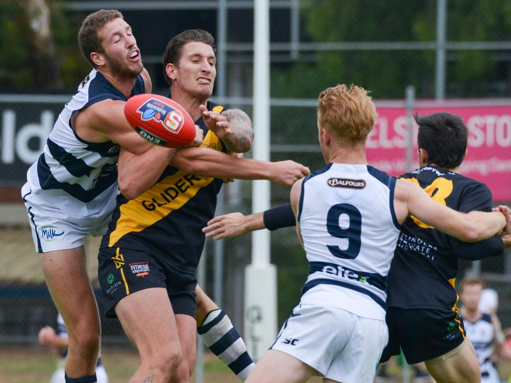 SANFL: Glenelg v South Adelaide at Glenelg Oval, Saturday, April 13, 2019. Michael Knoll spoils Glenelg's Jesse White. (AAP Image/Brenton Edwards),