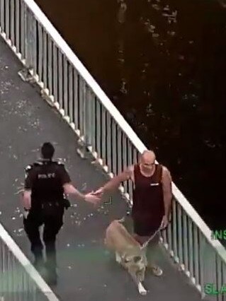 A police officer high-fives the bystander. Photo: Queensland Police