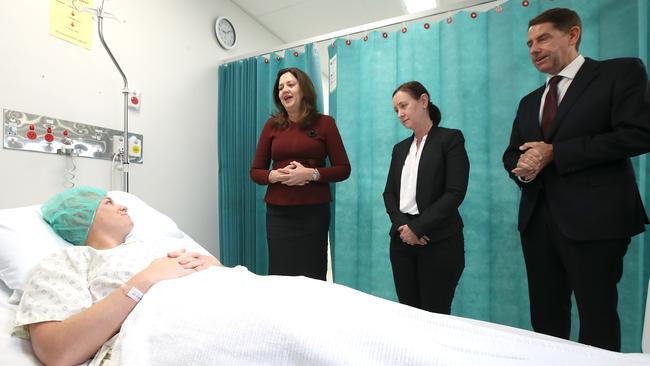 Premier of Queensland Annastacia Palaszczuk (C), Health Minister Yvette D’Dath (second Left) and Treasurer Cameron Dick speak with patient Catlin Sippel at the Mater Private hospital in Springfield Picture: NCA NewsWire / Jono Searle