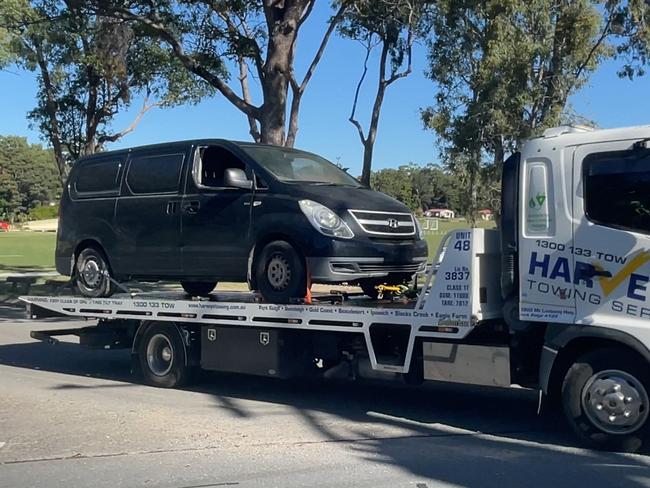 A tow truck removes the van from the scene. Picture: Charlton Hart.