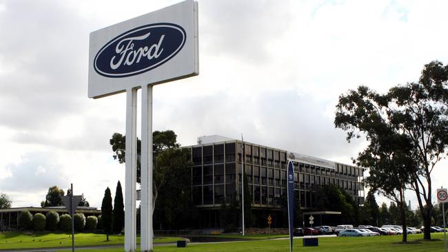 Workers at Ford's Broadmeadows factory in Victoria, leave at the end of their working day after the company advised that as many as 240 jobs will be lost from both the Broadmeadows and the Geelong plants, due to declining demands for large cars.