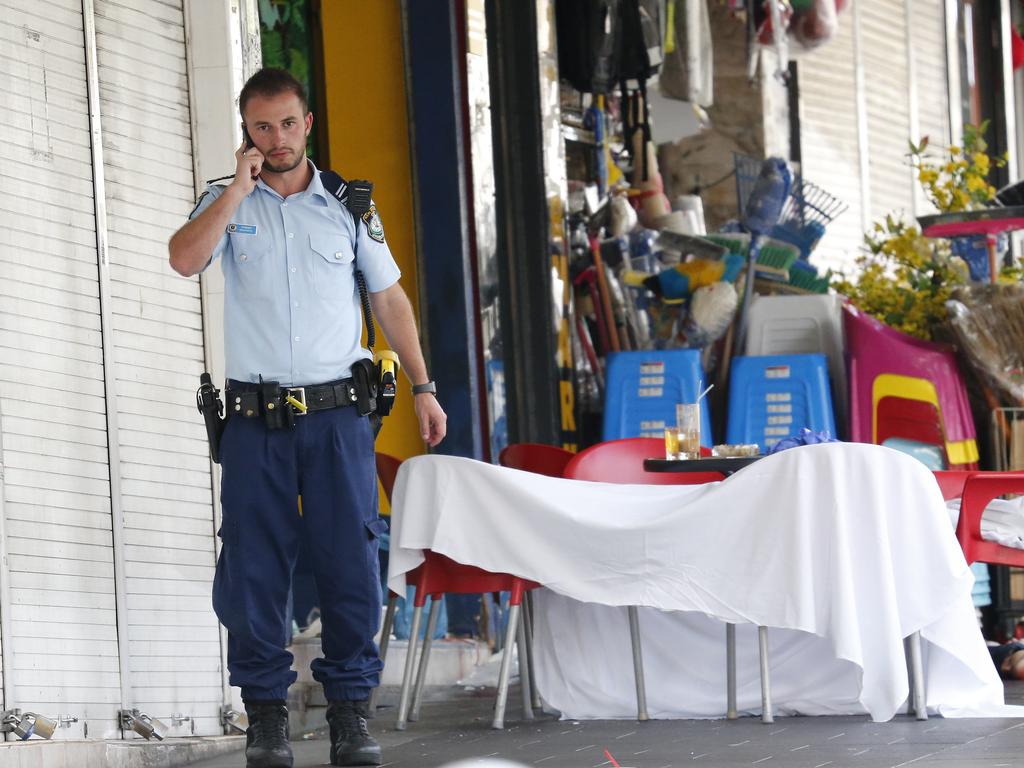 The scene outside the Happy Cup Cafe after Ho Ledinh was shot. Pictures: David Swift.