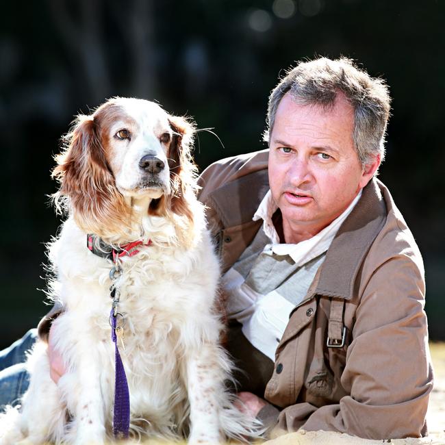 Mitch Geddes, from Pittwater Unleashed, with his dog Cooper. Picture: Adam Yip