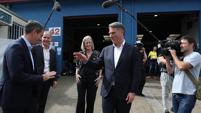 Deputy Labor Party Leader Richard Marles with Shadow Treasurer Jim Chalmers MP, Shadow Minister Senator Katy Gallagher, and Labor Candidate for Forde Rowan Holzeberger, visiting Munster Mechanical in Slacks Creek just outside Brisbane, to continue the Labor Party election campaign while Leader Anthony Albanese isolates at home in Sydney with Covid. Picture: Tim Hunter.