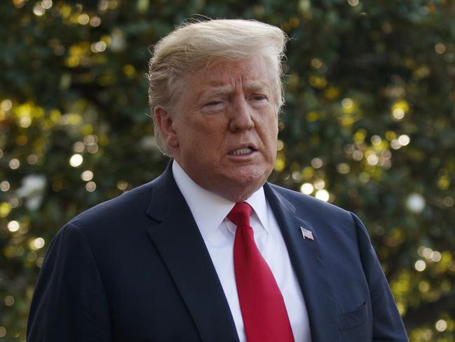 FILE - In this Thursday, May 30, 2019, file photo, President Donald Trump talks with reporters before departing on Marine One, in Washington. The majority owner of a former Trump-branded hotel in Panama alleged in a court filing on Monday, June 3, 2019, that the U.S. president's company misrepresented finances of the building to evade taxes in the country. (AP Photo/Evan Vucci, File)